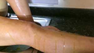 oiled-and-creamed-girl-gunged-on-holiday